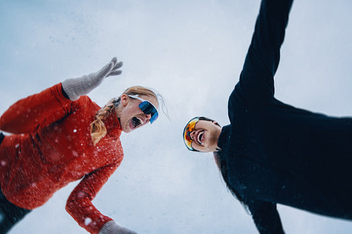 Women bring energy to running together in winter snowfall