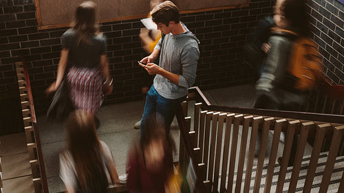 Students on steps of college campus