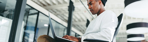 Coding expert working on a new project in a modern office