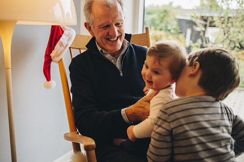 Senior man with his two grandsons
