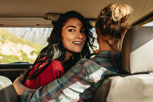 Couple in a car going on roadtrip