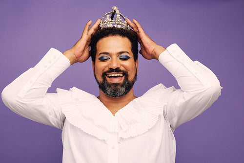 Portrait of drag queen with crown on head