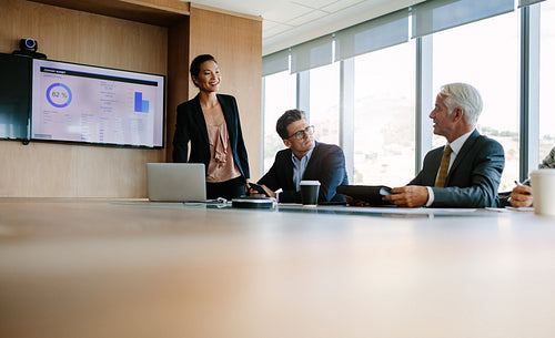 Business people sitting at corporate meeting