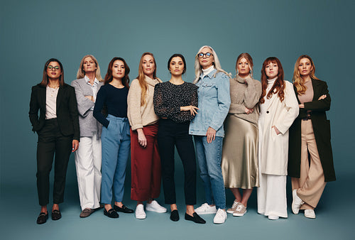 Women of different ages embracing girl power