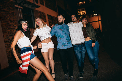 Cheerful young people having a party