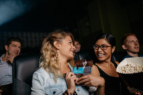 Group of people watching movie together