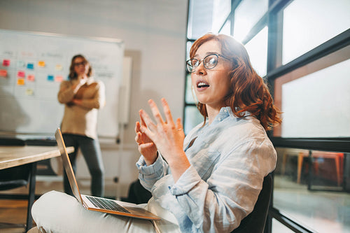 Collaborative business meeting with creative professionals in a modern office