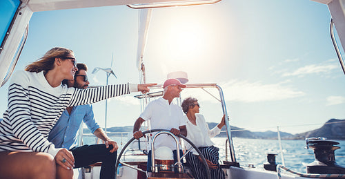 Group of people traveling in a yacht on a summer day