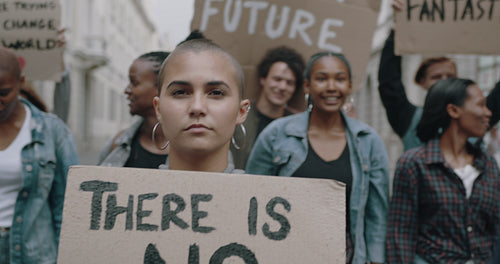 Group of protestors marching on the street