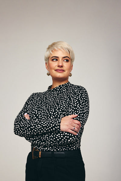 Mind-adult woman looking away in a studio