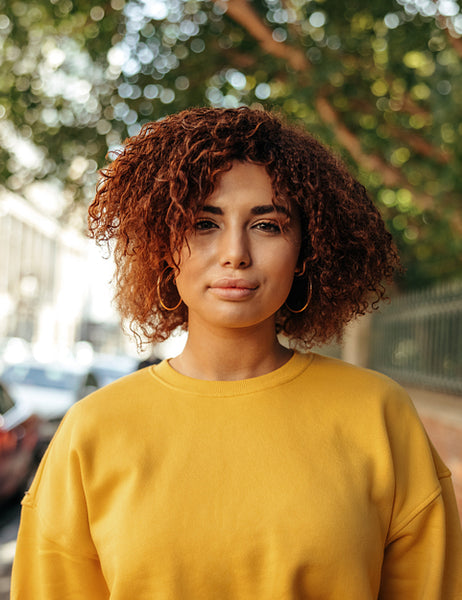 Confident teenage girl looking at the camera