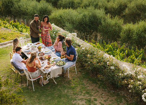 Couple at a party announcing their pregnancy