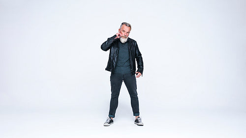 Senior man wearing jacket looking at camera