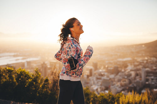 Young woman running outdoors