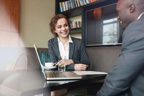 Business people working in cafe