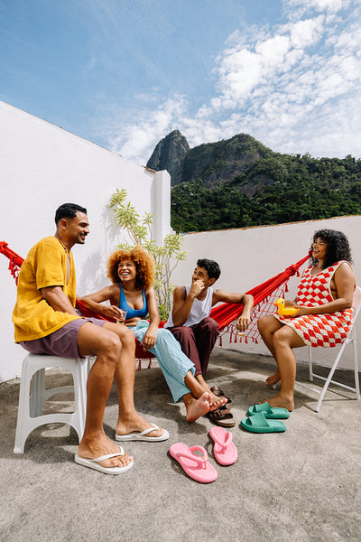 Group of friends enjoying a summer vacation near Corcovado in Rio de Janeiro