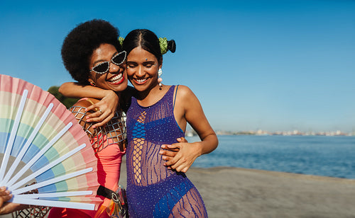 Two friends at a beach carnival