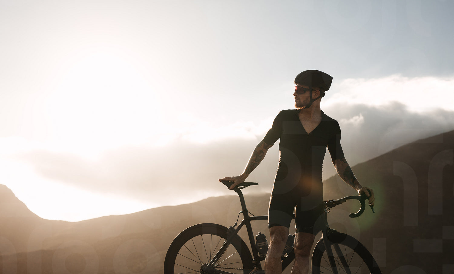 Pro Bike Rider Pro bike rider taking break while riding โ Jacob Lund Photography Store ...