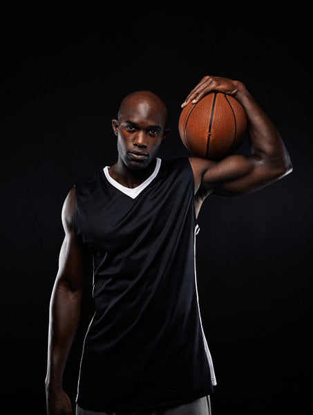 Professional basketball player holding a ball