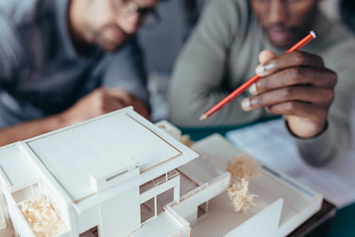 Two architects working on new construction project