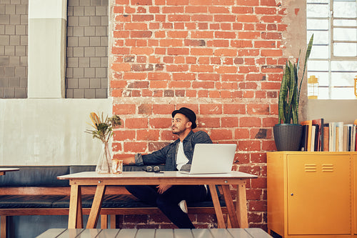 Man waiting for someone at coffee shop.
