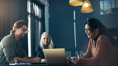 Happy business professionals meeting in office