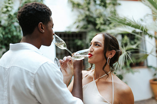 Romantic couple drinking sparkling wine together