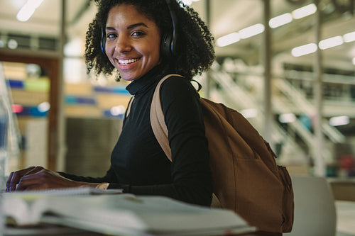 Female student studying in library