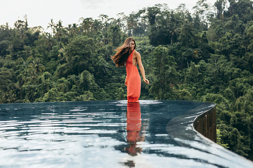 Attractive young woman in swimming pool