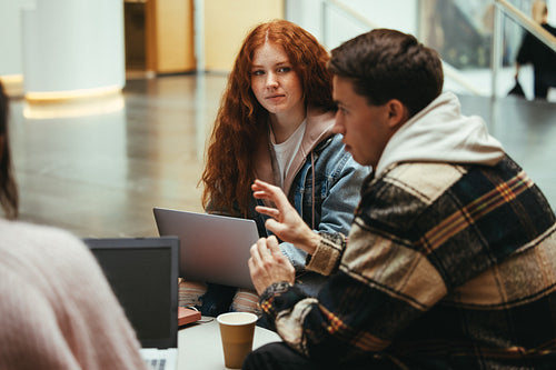 Students in group study in university campus