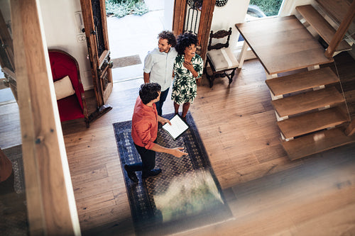 Agent showing home to buyers