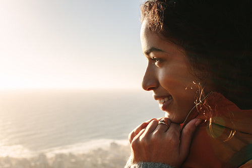 African woman enjoying the nature on winter day