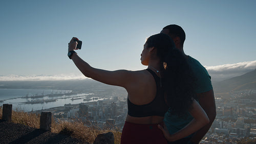Couple taking selfie after a morning run