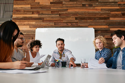 Team of young people having a meeting in office