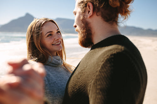 Beautiful woman with her boyfriend at the beach