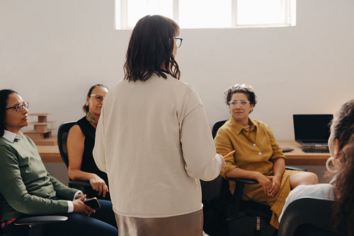 Team meeting in a contemporary office with natural lighting and collaboration