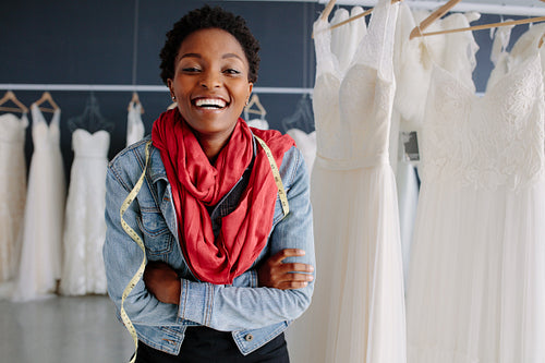 Portrait of smiling bridal store owner