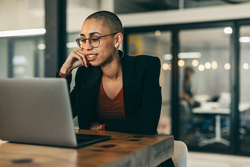 Young businesswoman attending a virtual meeting in an office