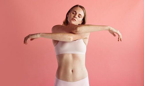 Portrait of woman with freckles on body