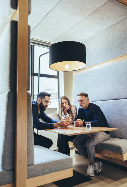 Group of businesspeople working in a co-working space