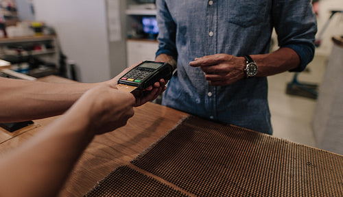 Customer making payment using credit card