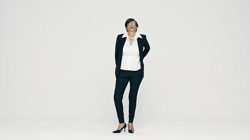 Senior businesswoman on white background
