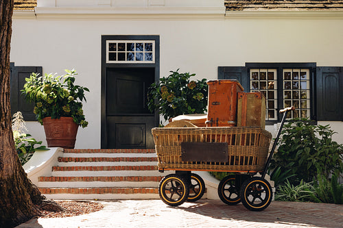 Vacation bags outside a hotel