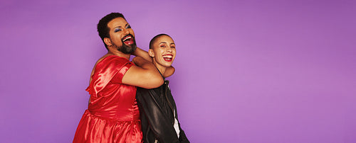 Lgbtq friends together on purple background