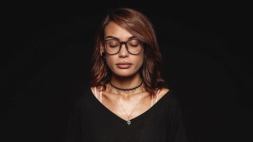 Portrait of a woman with eyes closed