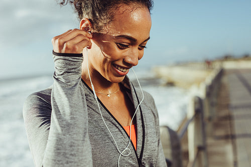 Runner listening to music while exercising