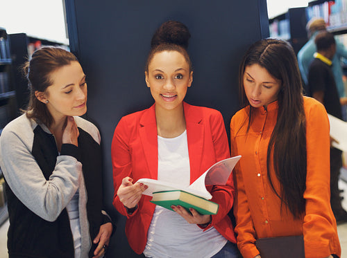 Young female students studying together for exams