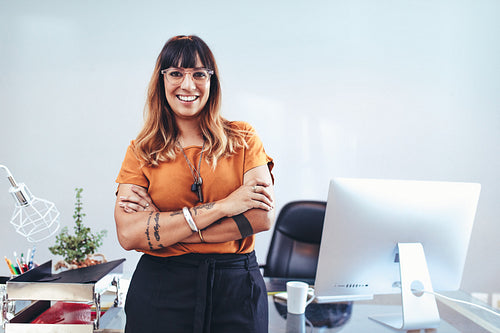 Businesswoman standing in her office