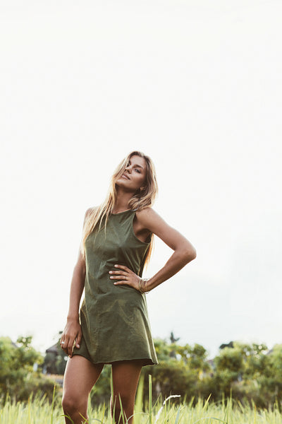Caucasian female model standing in remote field