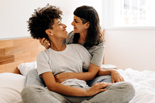 Romantic lesbian couple at home